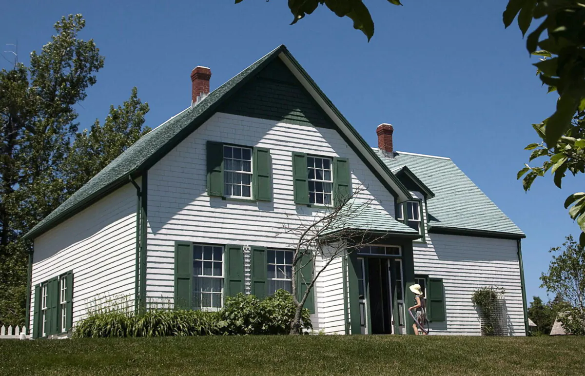 A young girl enters Green Gables Heritage Place, which served as the setting for the “Anne of Green Gables” novels by Lucy Maud Montgomery, in Cavendish, Prince Edward Island, in a file photo. (The Canadian Press/Andrew Vaughan)