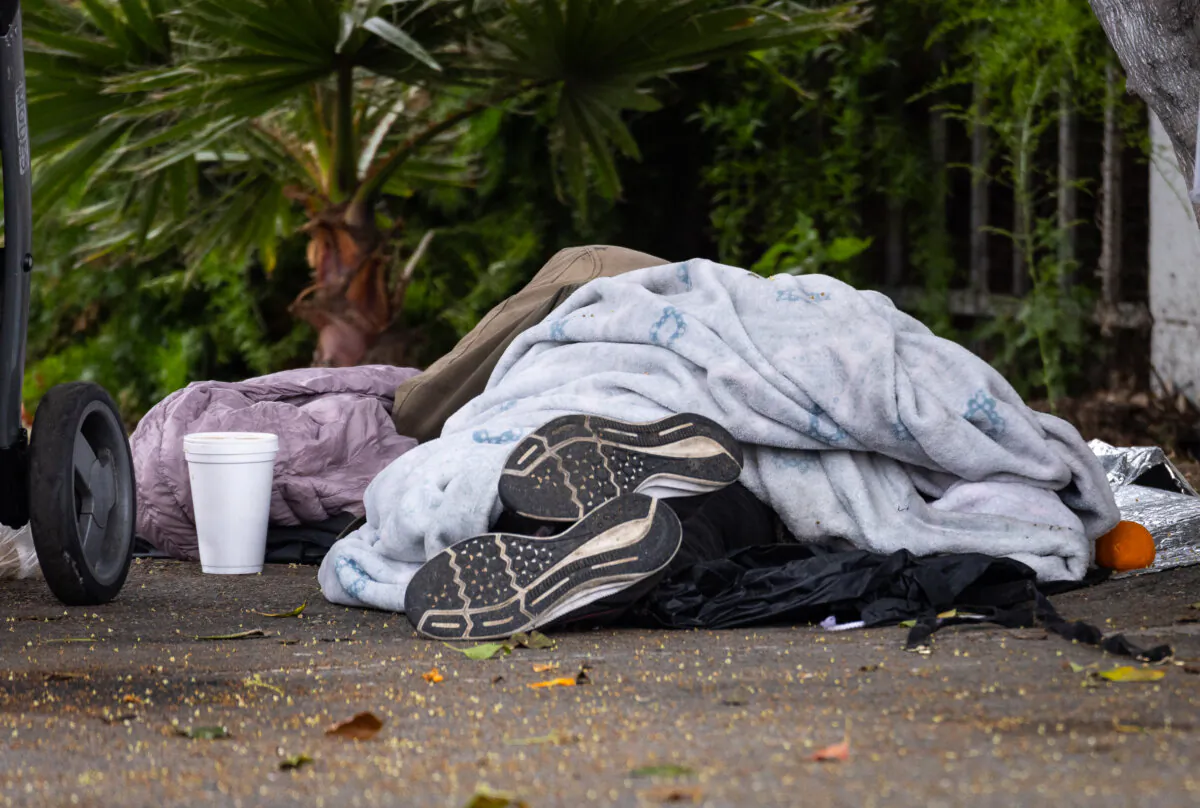 A homeless individual in Santa Ana, Calif., on April 23, 2024. (John Fredricks/The Epoch Times)