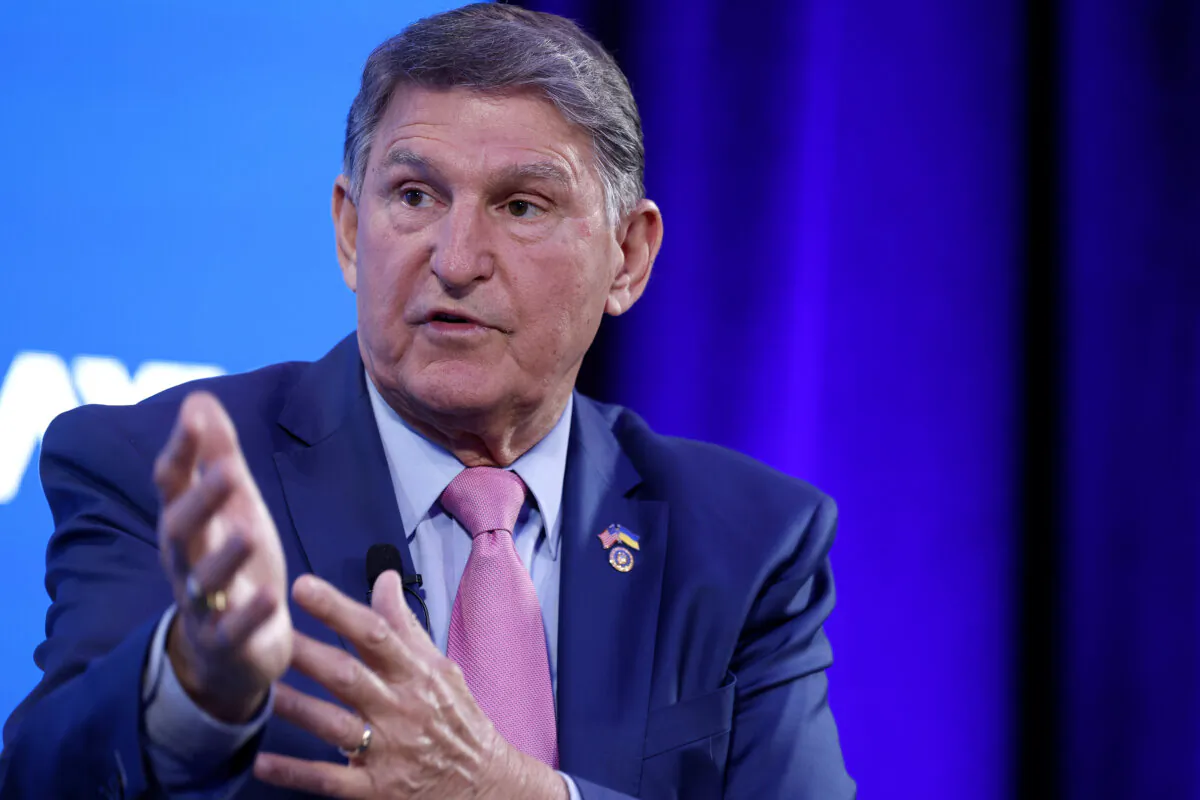 Sen. Joe Manchin (D-W.Va.) speaks during the third annual Axios What's Next Summit at the Planet Word Museum in Washington on March 19, 2024. (Chip Somodevilla/Getty Images)