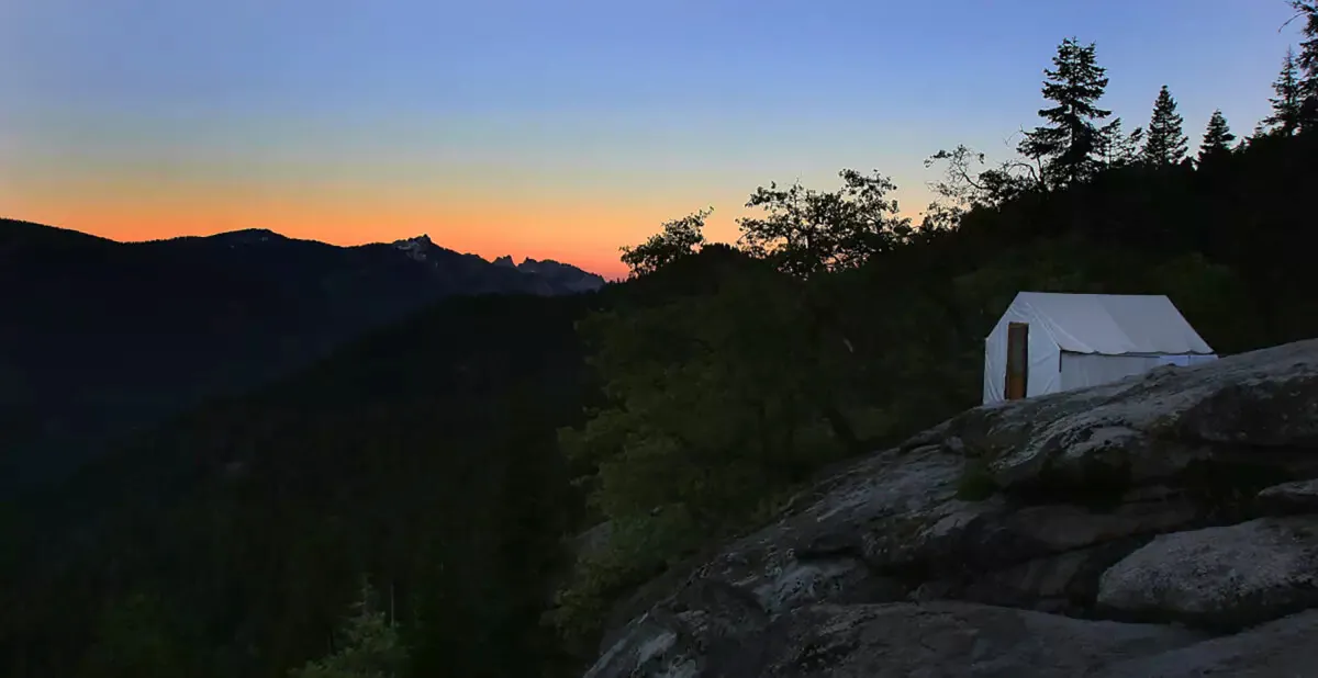 A tent is shown at dusk at a High Sierra Camp in Yosemite National Park. The park is reopening three of the five campsites this summer. (Brian van der Brug/Los Angeles Times/TNS)