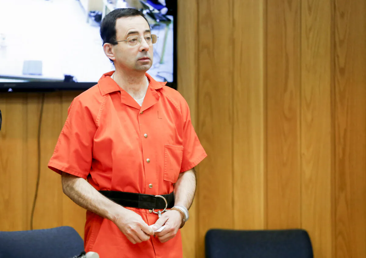 Larry Nassar, a former team USA Gymnastics doctor who pleaded guilty in November 2017 to sexual assault charges, stands in court during his sentencing hearing in the Eaton County Court in Charlotte, Michigan, U.S., Feb. 5, 2018. (Rebecca Cook/Reuters)