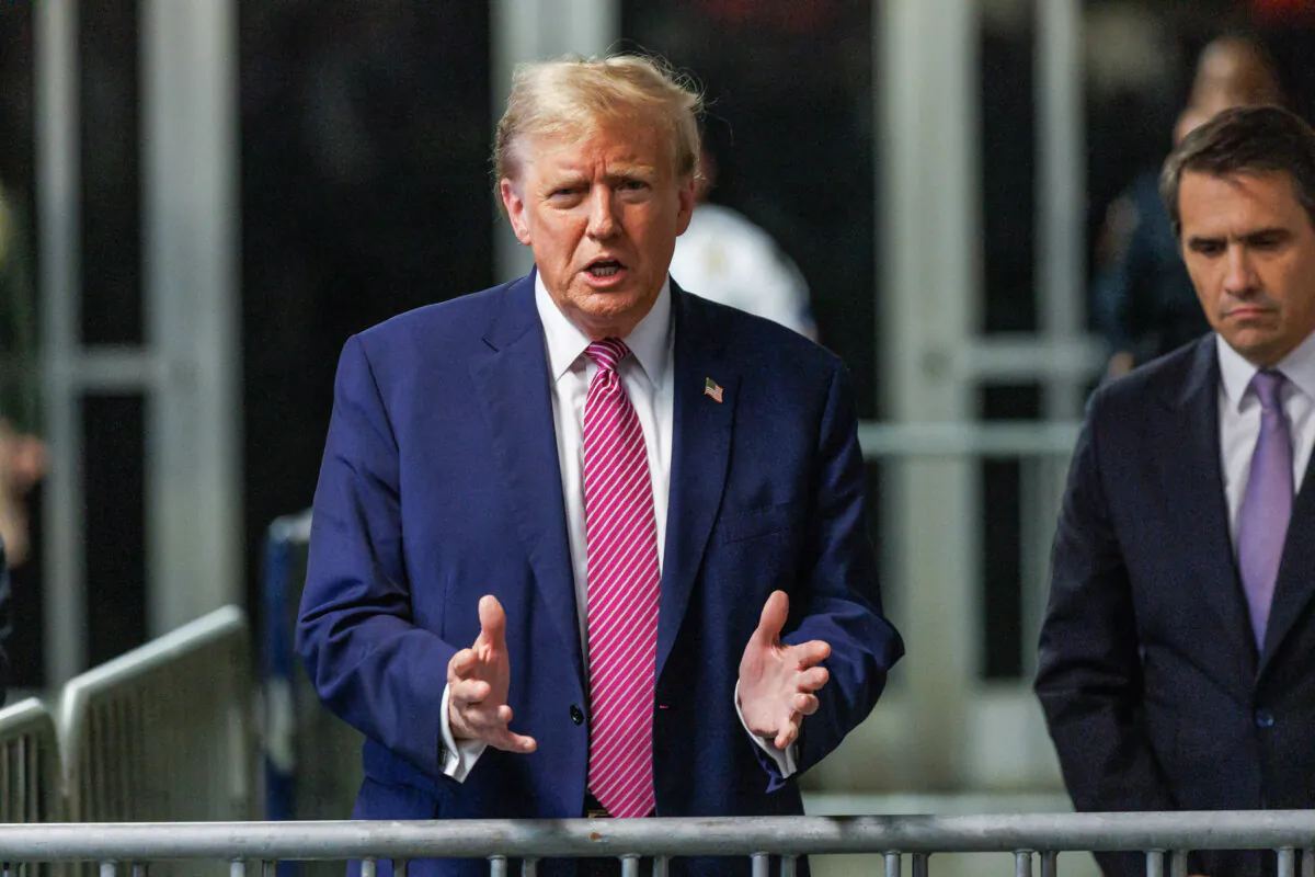Former President Donald Trump speaks to the media after leaving the courtroom for the day at Manhattan Criminal Court during his trial for allegedly covering up hush money payments linked to extramarital affairs in New York on April 19, 2024. (Sarah Yenesel/Pool/AFP via Getty Images)