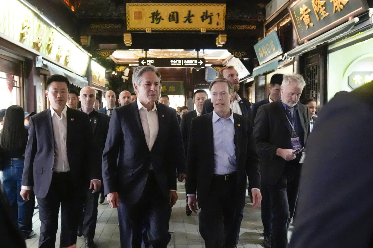 US Secretary of State Antony Blinken (centre L) and US Ambassador to China Nicholas Burns walk through the Yu Gardens in Shanghai on April 24, 2024. (Photo by Mark Schiefelbein / POOL / AFP) (Photo by MARK SCHIEFELBEIN/POOL/AFP via Getty Images)