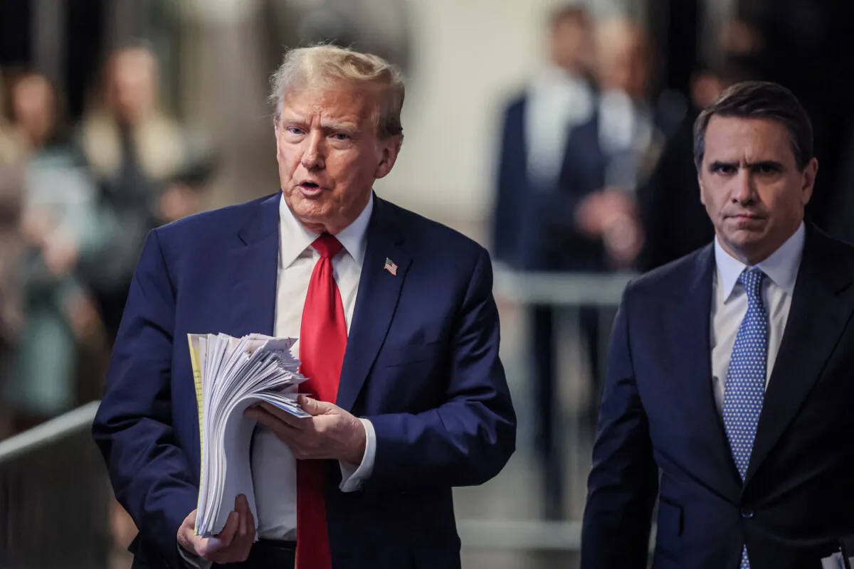 Former President Donald Trump speaks to the media along with his attorney Todd Blanche (R) outside the courtroom at Manhattan Criminal Court in New York City. on April 23, 2024 (Brendan McDermid-Pool/Getty Images)