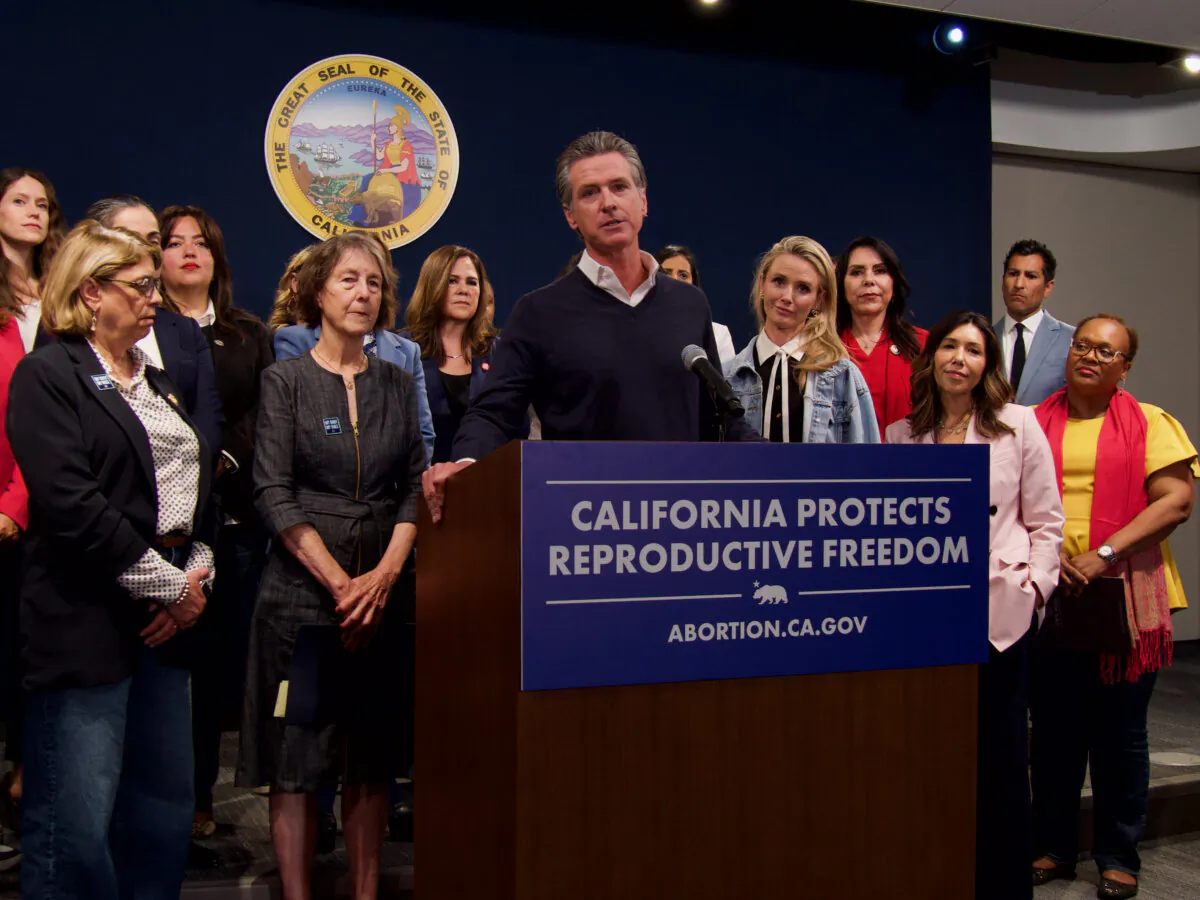 Gov. Gavin Newsom speaks in support of Senate Bill 233, which would allow Arizona doctors to perform abortions in California, during a press conference at the Capitol on April 24, 2024. (Travis Gillmore/The Epoch Times)