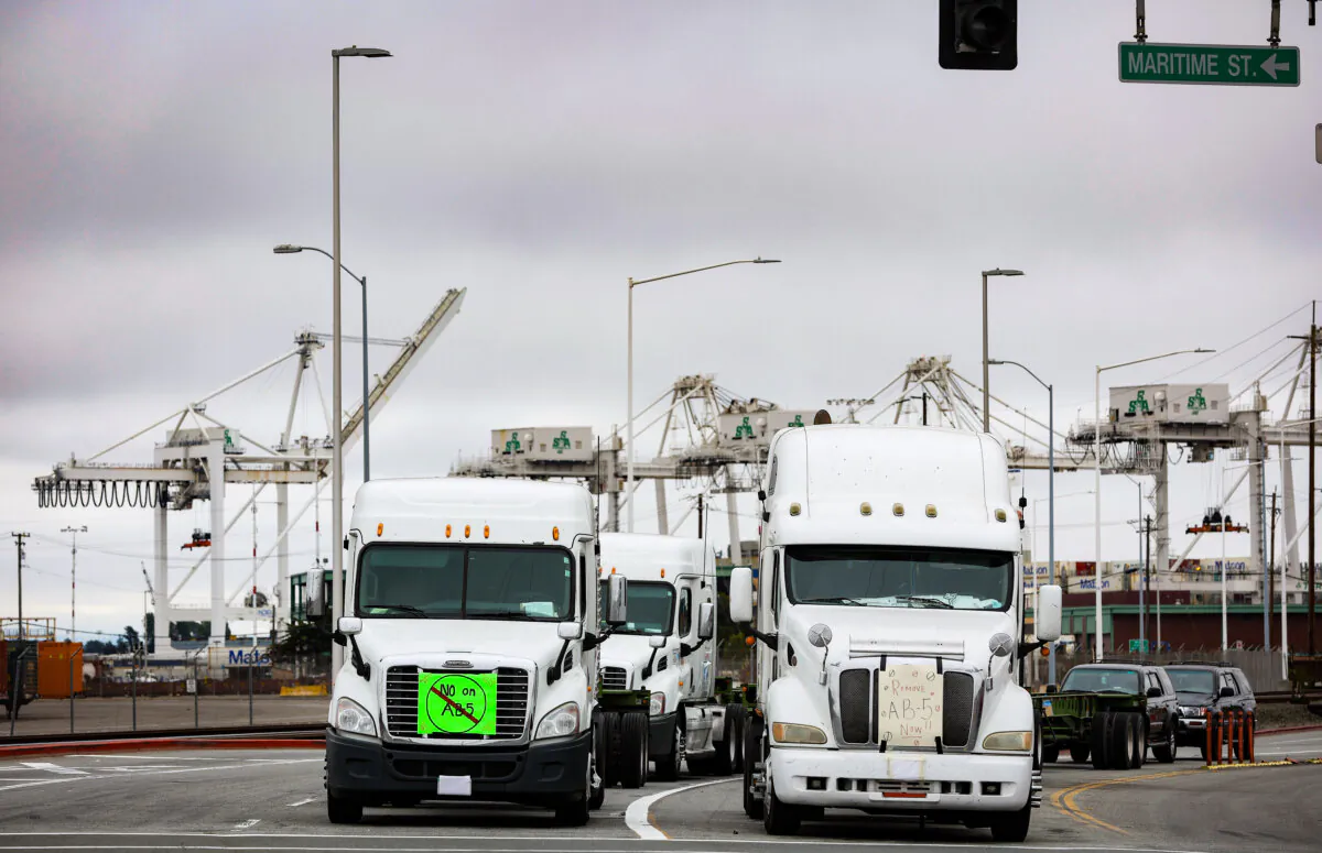 Trucks sit idle as they block the entrance to a container terminal at the Port of Oakland in Oakland, Calif., on July 21, 2022. (Justin Sullivan/Getty Images)