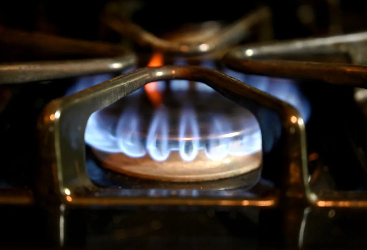 Blue flames from a gas at a home in Arlington, Va., on May 3, 2023. (Olivier Douliery/AFP via Getty Images)