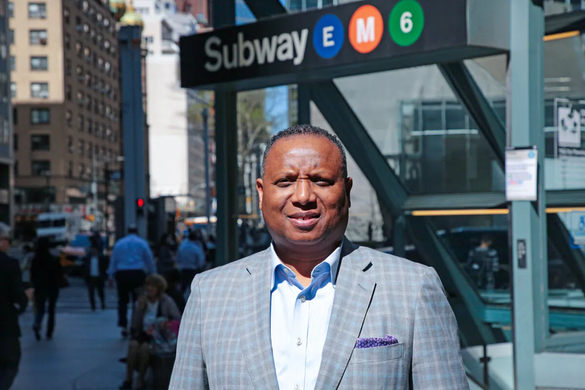 Fitzgerald Miller, who blames the influx of 2.4 million illegal immigrants on President Joe Biden, is in New York City on April 16, 2024. (Richard Moore/The Epoch Times)