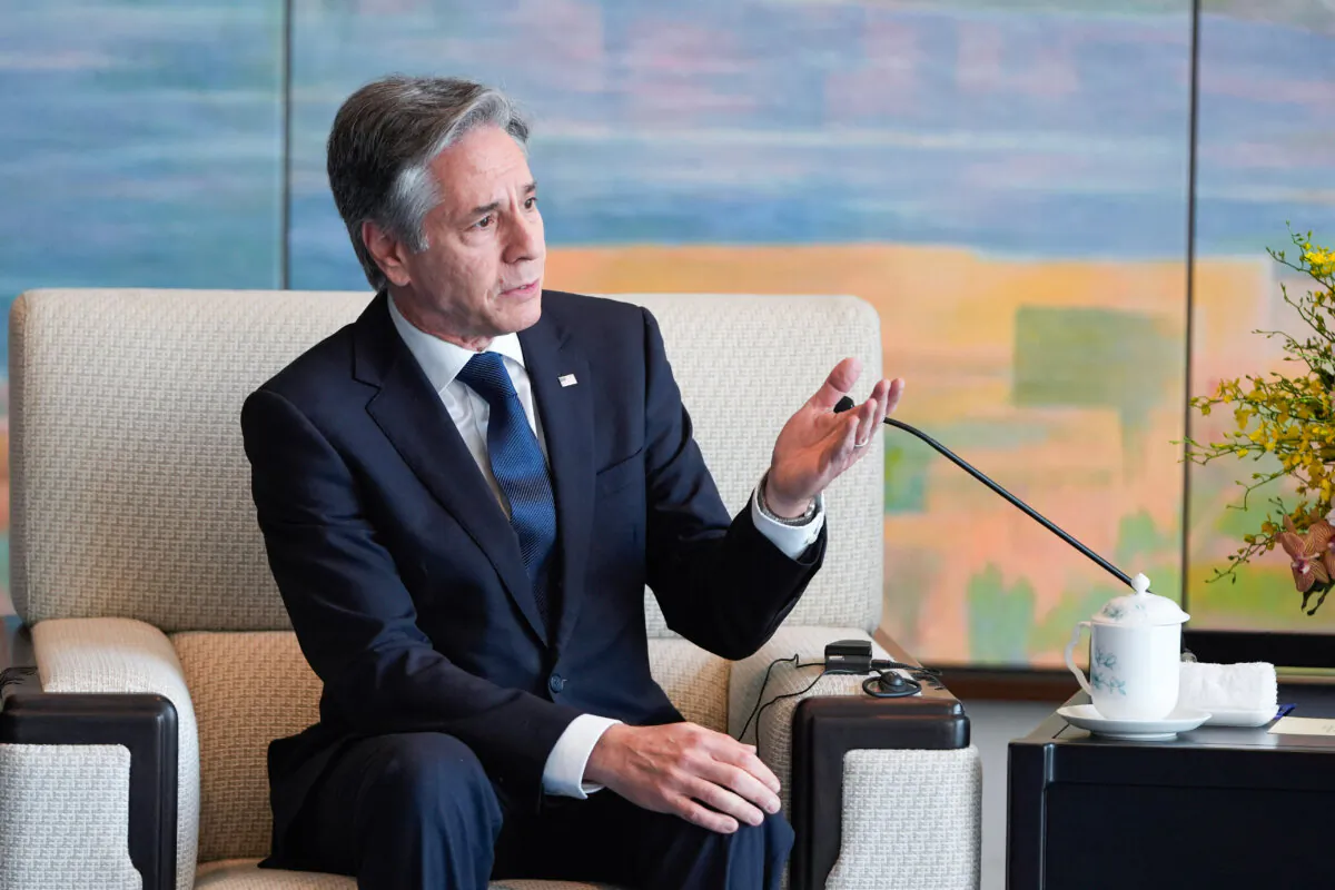 U.S. Secretary of State Antony Blinken talks with Shanghai Party Secretary Chen Jining during a meeting at the Grand Halls in Shanghai on April 25, 2024. (Mark Schiefelbein/POOL/AFP via Getty Images)