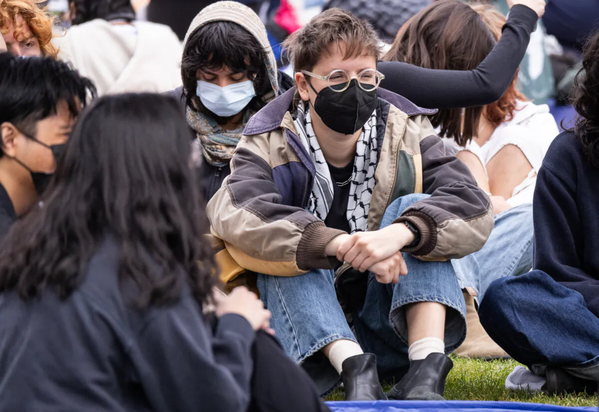 UCLA students protest the Israel-Hamas conflict, on the UCLA campus in Los Angeles on April 25, 2024. (John Fredricks/The Epoch Times)