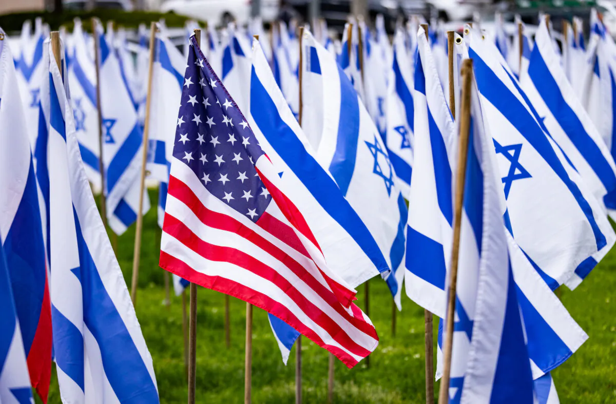 Flags of the United States and Israel wave in Beverly Hills, Calif., on April 25, 2024. (John Fredricks/The Epoch Times)