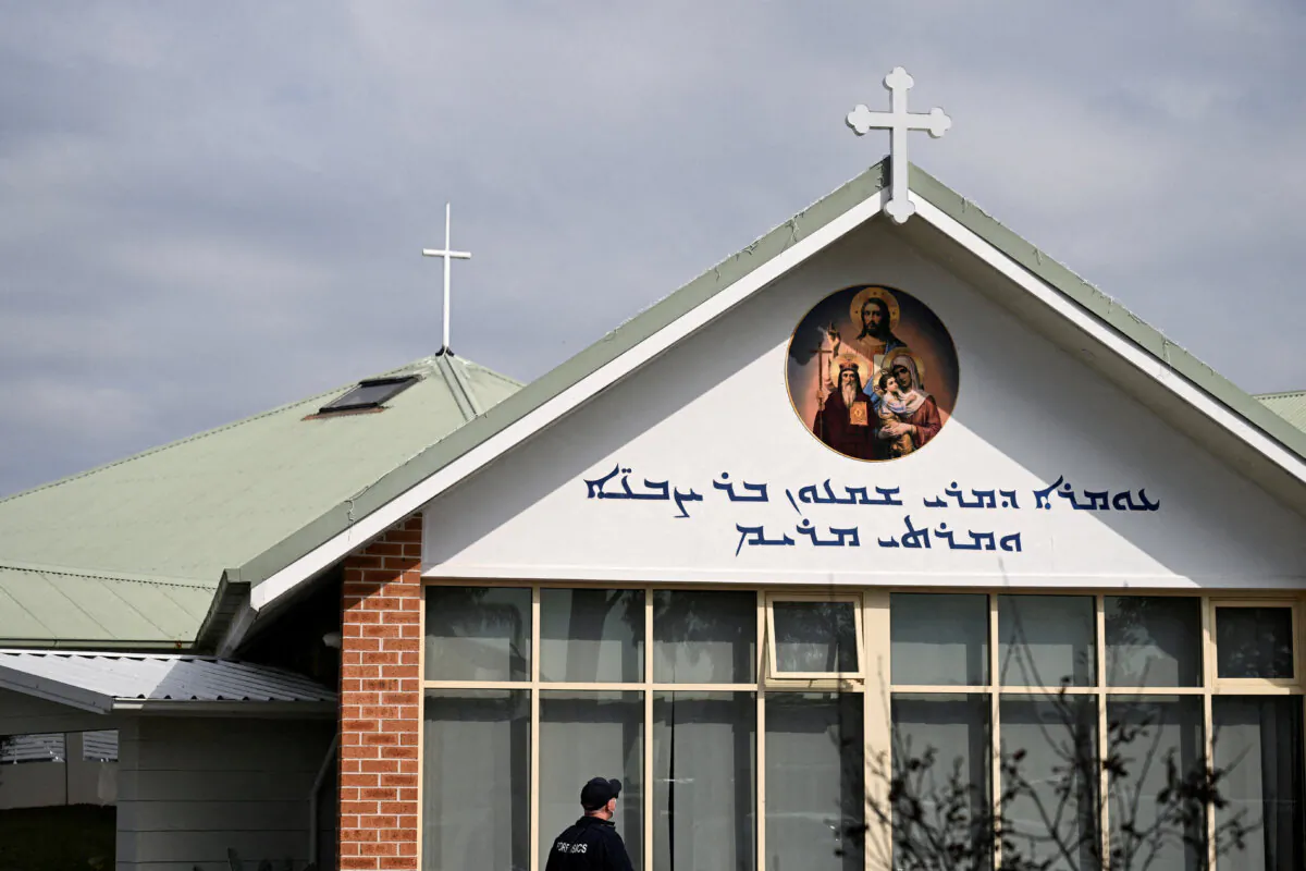Police investigate at the Assyrian Christ The Good Shepherd Church after a knife attack took place during a service the night before, in Wakeley in Sydney, Australia, April 16, 2024. REUTERS/Jaimi Joy/File Photo