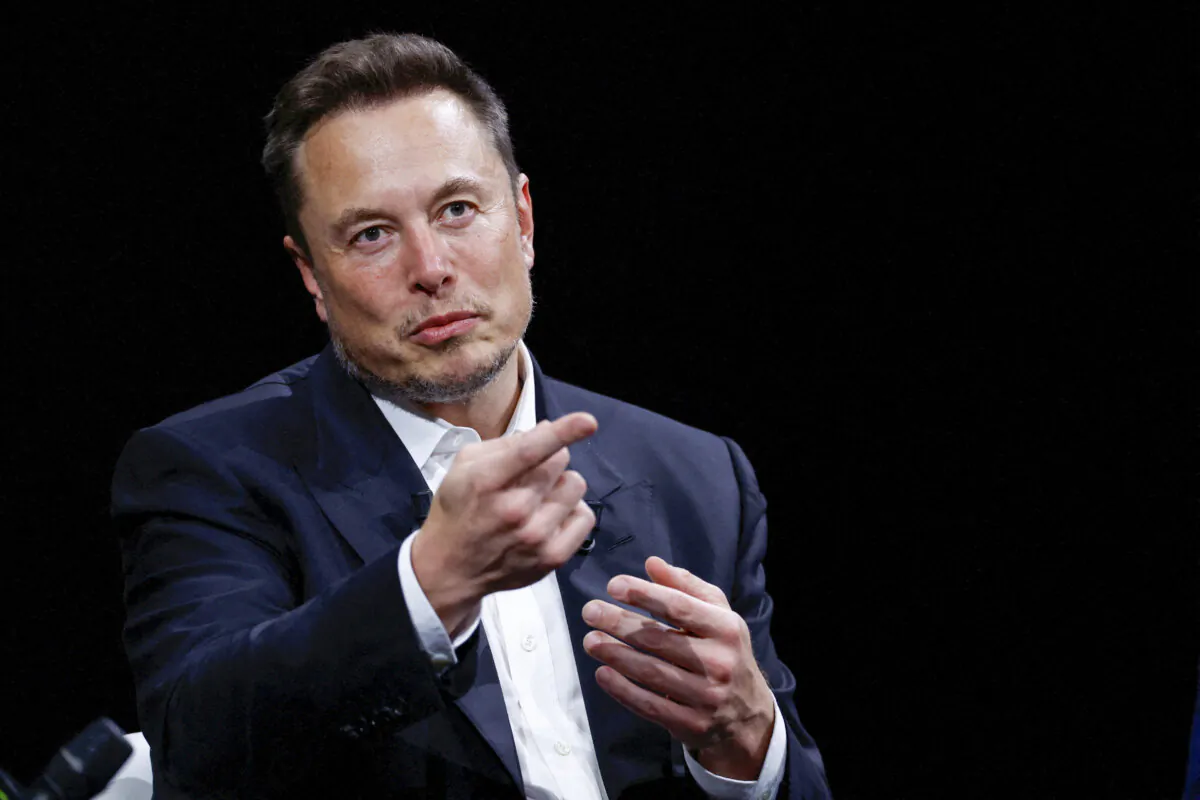 Elon Musk gestures as he attends the Viva Technology conference at the Porte de Versailles exhibition centre in Paris, France, on June 16, 2023. (Gonzalo Fuentes/Reuters)
