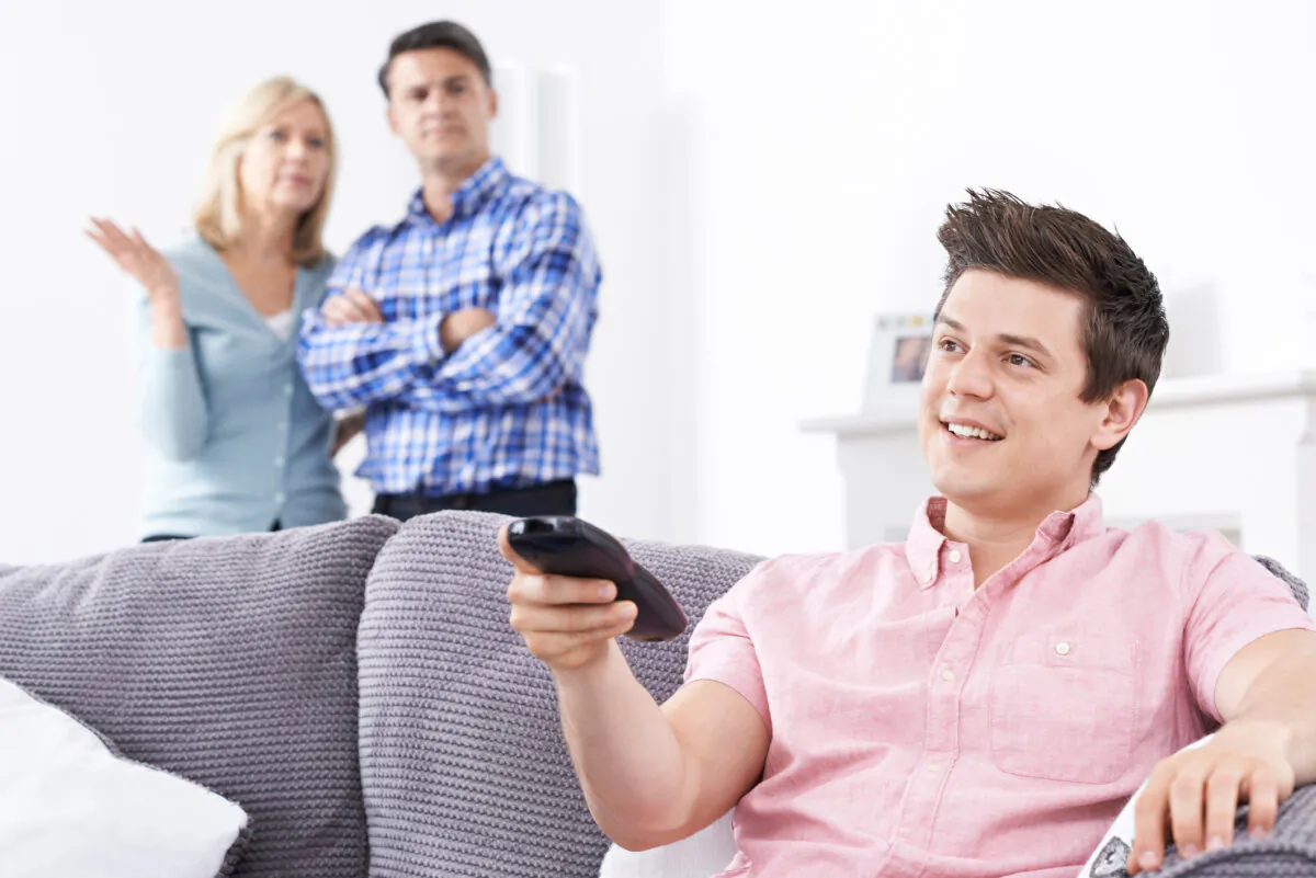 There may come a time when adult children need to be treated like roommates or tenants, rather than kids. (SpeedKingz/Shutterstock)