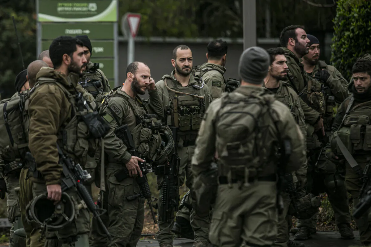 Israeli soldiers prepare to secure a village near the border with Lebanon in Mevo'ot HaHermon, Israel, on Jan. 15, 2024. (Amir Levy/Getty Images)