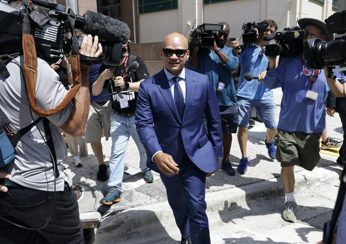 Walt Nauta, valet to former President Donald Trump and a co-defendant in federal charges filed against Trump leaves with lawyer, Stanley Woodward, at the James Lawrence King Federal Justice Building in Miami, Fla., on July 6, 2023. (Alon Skuy/Getty Images)