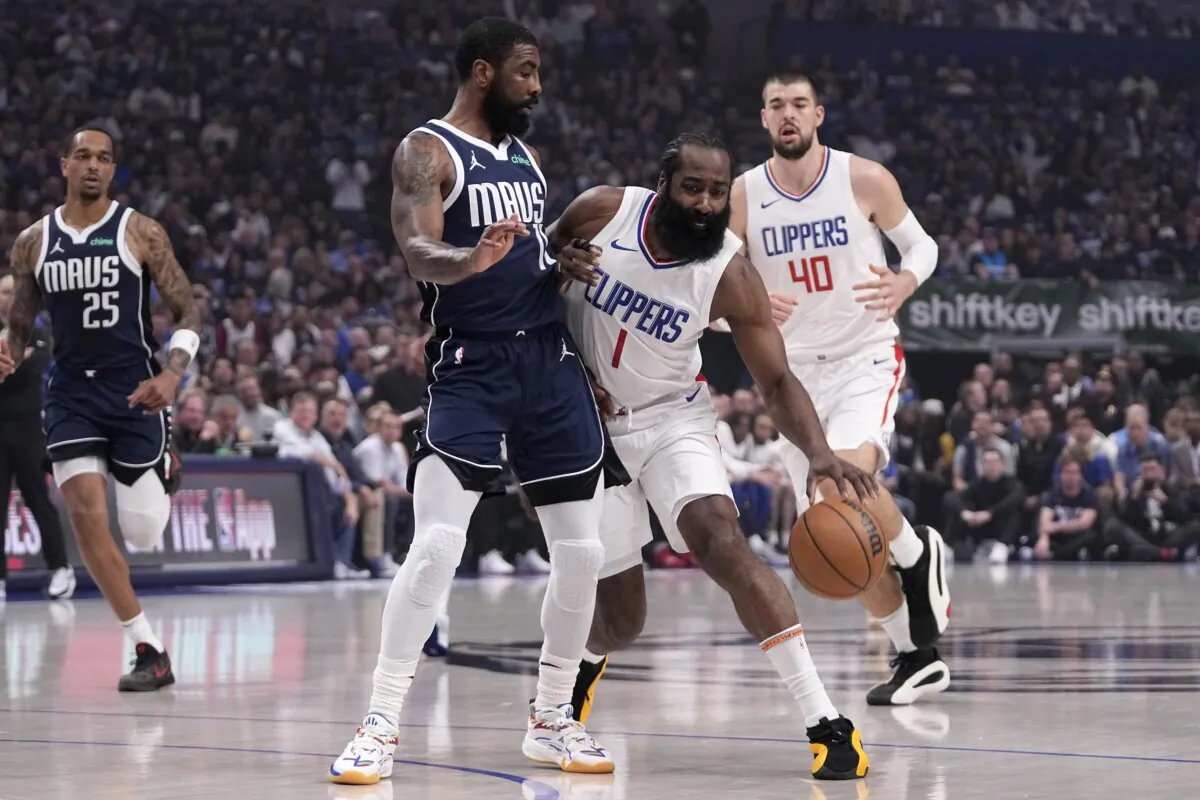 Los Angeles Clippers' James Harden (1) works around Dallas Mavericks guard Kyrie Irving during the first half of Game 3 of an NBA basketball first-round playoff series in Dallas on April 26, 2024. (Tony Gutierrez/AP Photo)