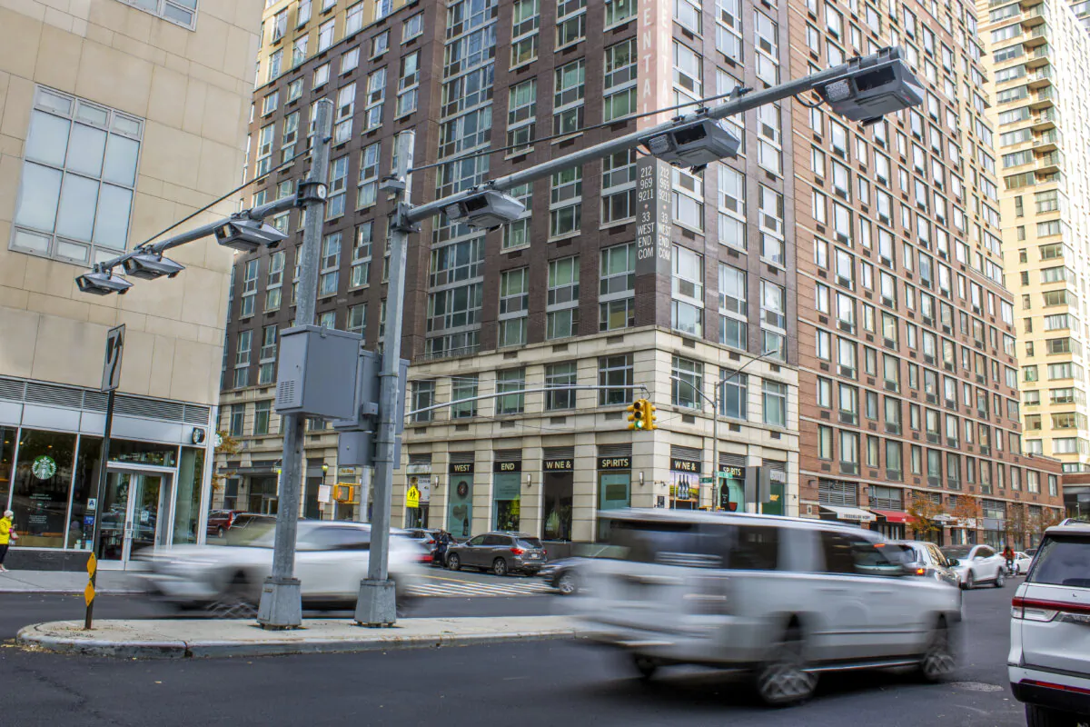 Recently installed toll traffic cameras hang above West End Ave. near 61st Street in the Manhattan borough of New York, Friday, Nov. 16, 2023. The start date for the $15 toll most drivers will be charged to enter Manhattan's central business district will be June 30, transit officials said Friday, April 26, 2024.  (AP Photo/Ted Shaffrey)