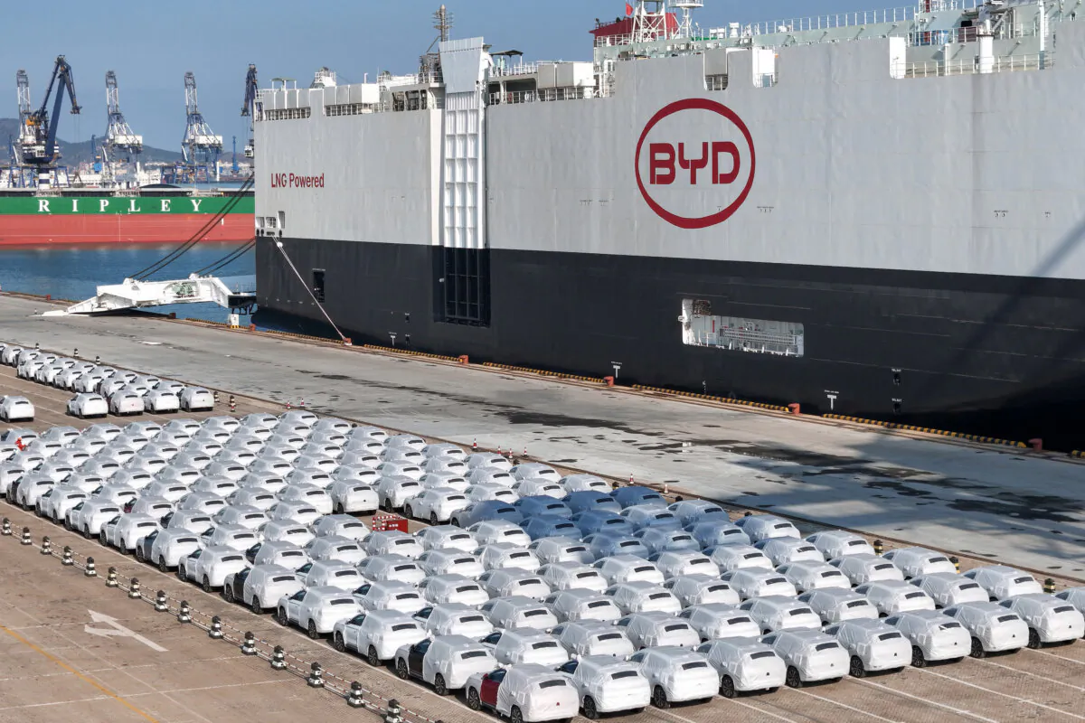 BYD electric cars wait to be loaded onto a domestically manufactured vessel intended to export Chinese automobiles, at Yantai port, in eastern China's Shandong province, on Jan. 10, 2024. (Photo by STR/AFP via Getty Images)