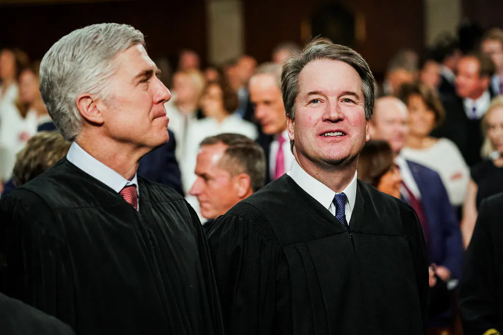 Supreme Court Justices Neil Gorsuch (L) and Brett Kavanaugh (R) attend the State of the Union address in the chamber of the U.S. House of Representatives at the U.S. Capitol on Feb. 5, 2019. (Doug Mills-Pool/Getty Images)