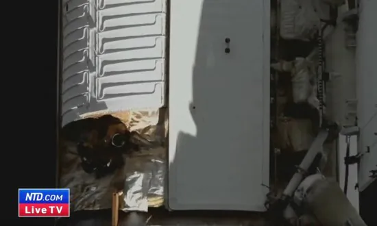 Russian Cosmonauts Take a Spacewalk at the International Space Station