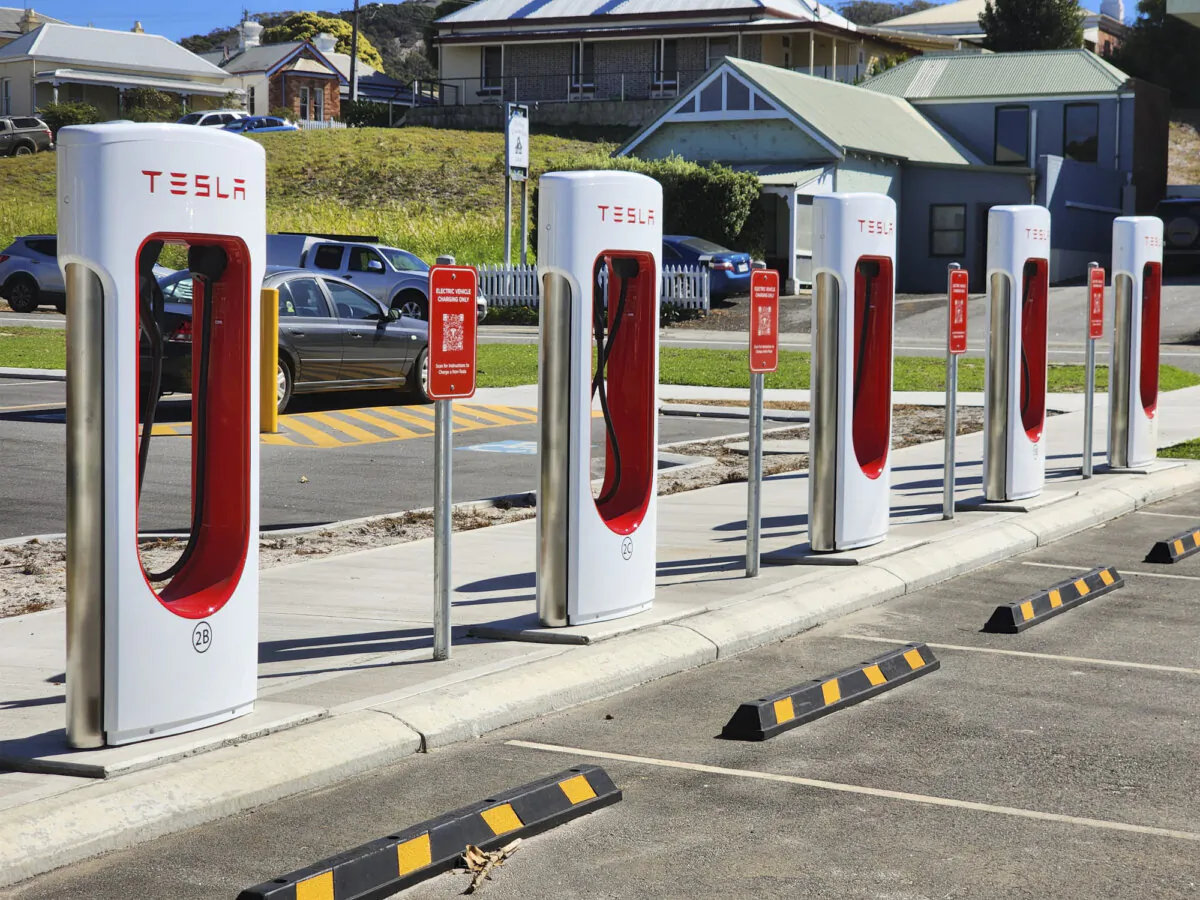 A row of Tesla electric vehicle charging stations in Albany, Western Australia, on April 19, 2024. (Susan Mortimer/The Epoch Times)