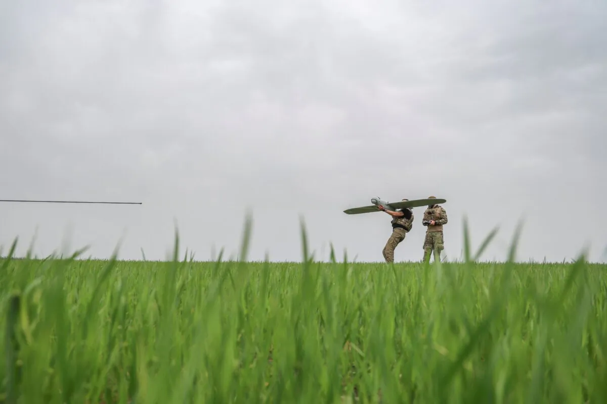 Ukrainian servicemen launch a Leleka reconnaissance unmanned aerial vehicle, Donetsk region, on April 26, 2024. (Oleksandr Ratushniak/Reuters)