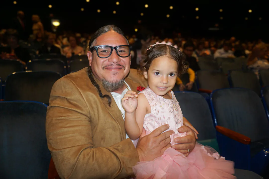 Angel Ruiz and his daughter attended Shen Yun Performing Arts at the Knoxville Civic Auditorium and Coliseum in Knoxville, Tenn. on April 28, 2024.(Yeawen Hung/The Epoch Times)