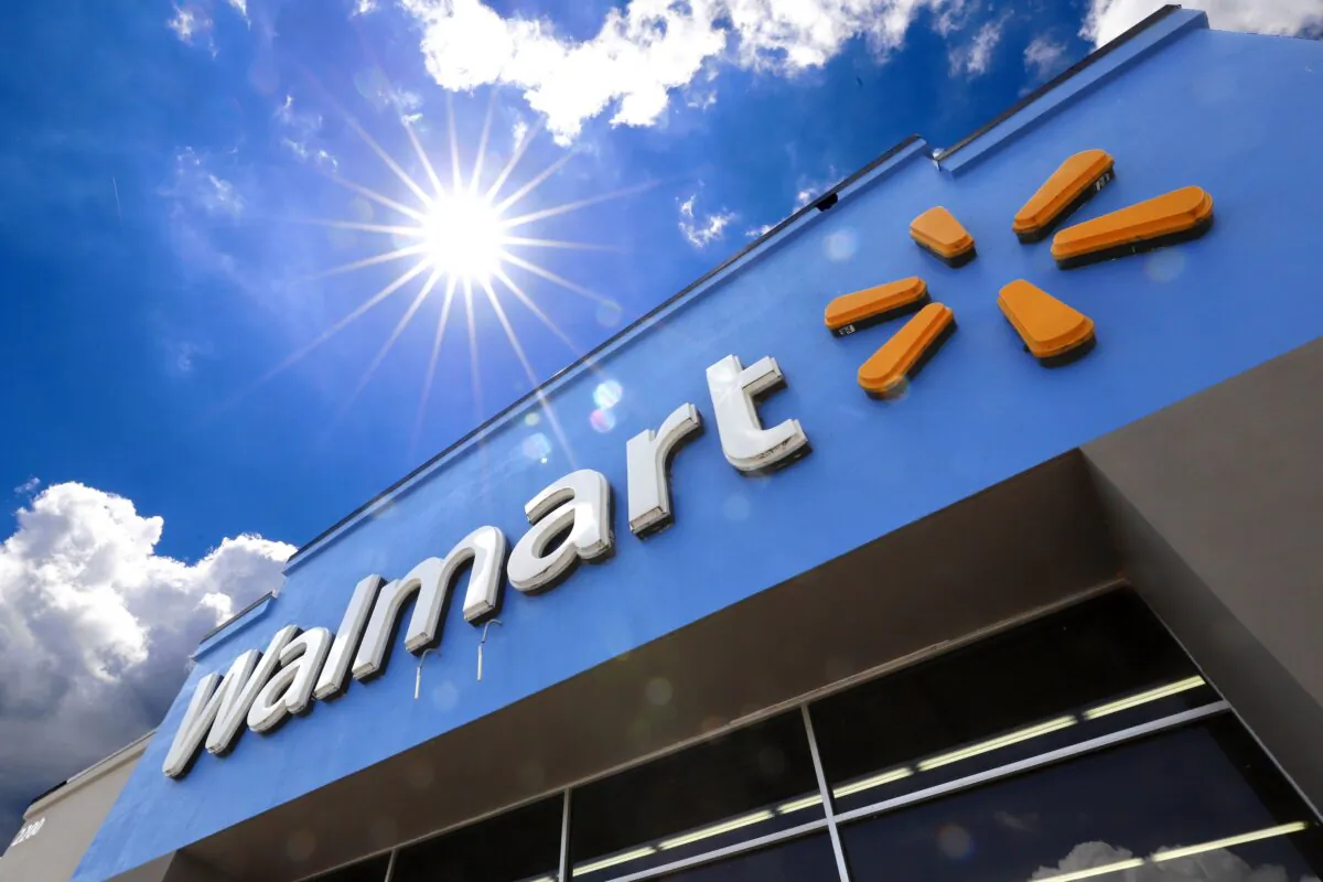 A Walmart sign is displayed over the entrance to a store, June 25, 2019, in Pittsburgh. Walmart said on April 30, 2024, that it is launching its biggest store-label food brand in 20 years in terms of its breadth of items, as it seeks to appeal to younger customers who are not brand loyal and want chef-inspired foods that are more affordably priced. (AP Photo/Gene J. Puskar, File)