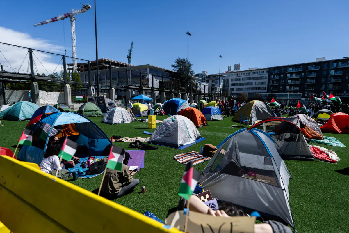 A field is filled with tents during a “student encampment for Palestine” at the University of British Columbia campus in Vancouver on April. 29, 2024. (The Canadian Press/Ethan Cairns)
