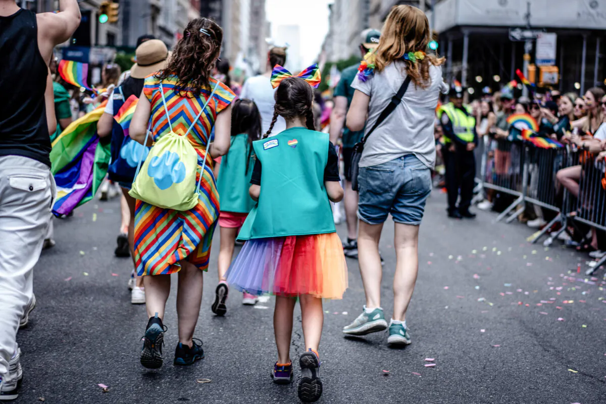 A young girl at the annual New York City Pride March in New York City on June 25, 2023. (Samira Bouaou/The Epoch Times)