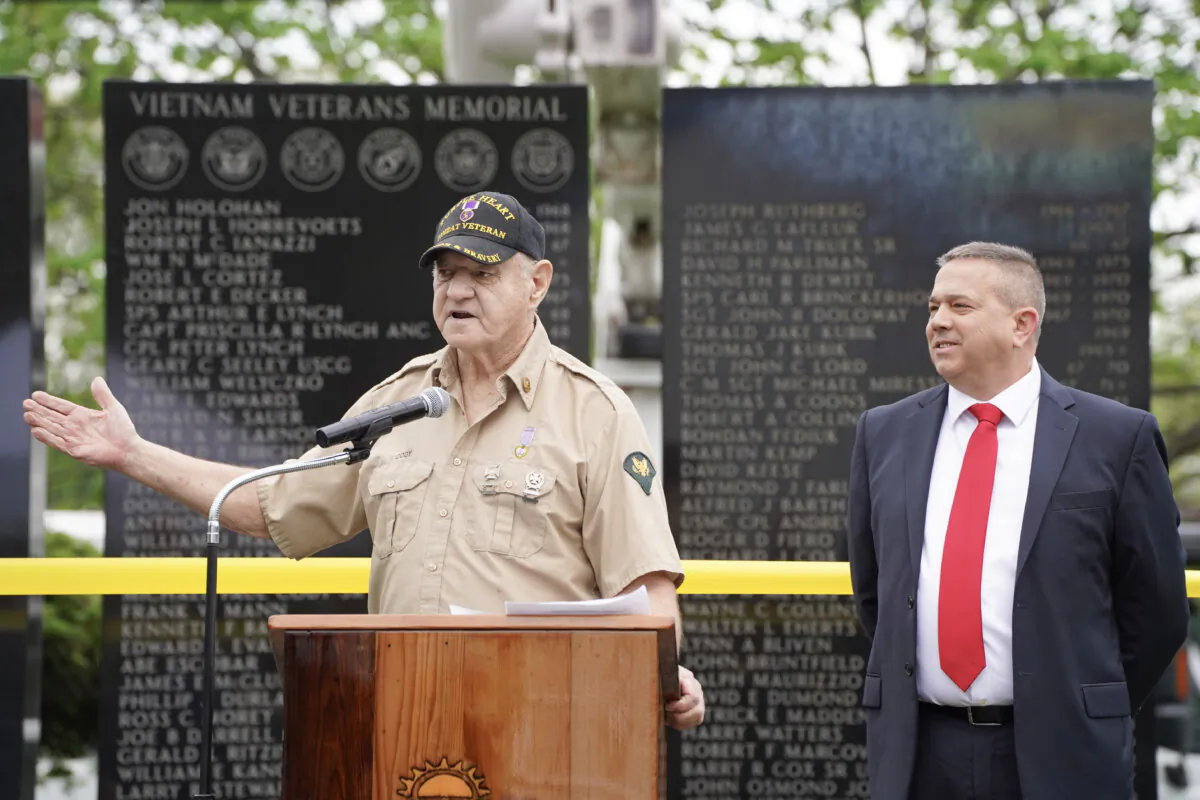 Mike Cody (L) and Mark Coyne, president and vice president at Town of Wallkill Vietnam Veterans Memorial Wall Committee, respectively, at a dedication ceremony in Middletown, N.Y., on April 30, 2024. (Cara Ding/The Epoch Times)