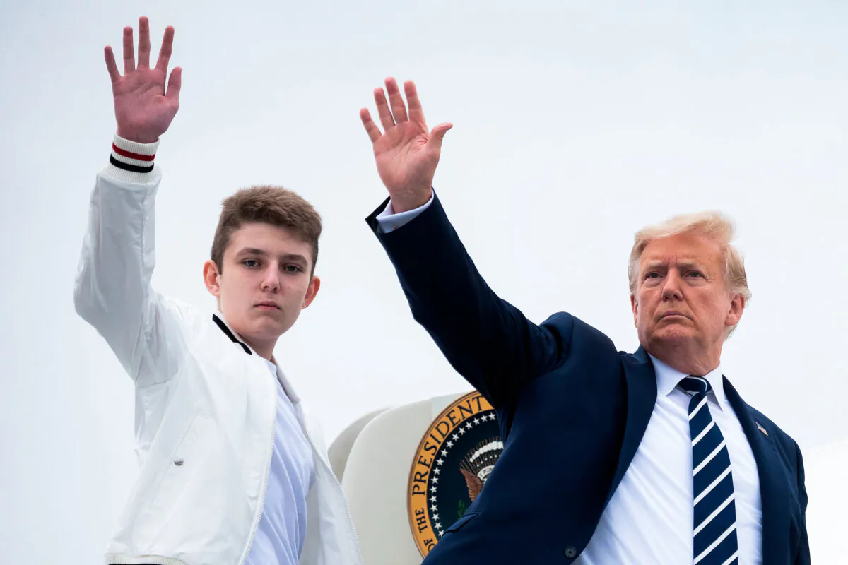 President Donald Trump (R) and his son Barron wave as they board Air Force One at Morristown Municipal Airport in Morristown, N.J., on Aug. 16, 2020. (Jim Watson/AFP via Getty Images)