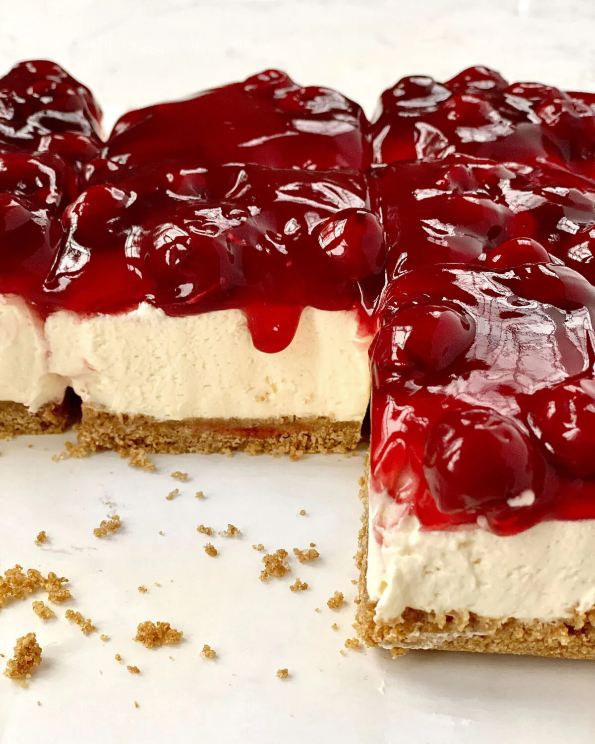 With its glossy red top, creamy filling, and salty-sweet crust, this no-bake dessert will wow everyone. (Kelli Foster/TNS)