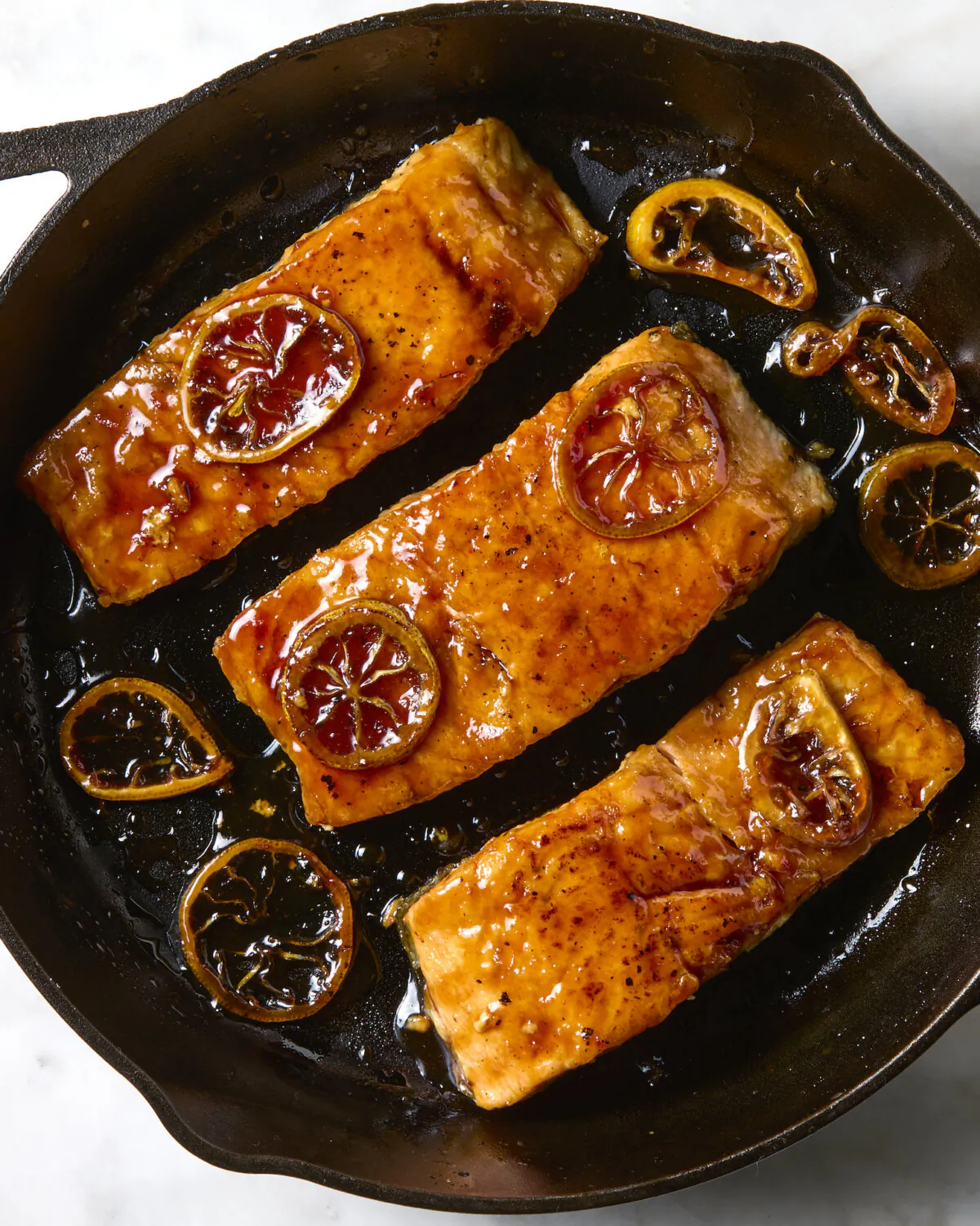 Lemony, umami-packed salmon is prepared in under 20 minutes, making a perfect weeknight dinner. (Alex Lepe/TNS)