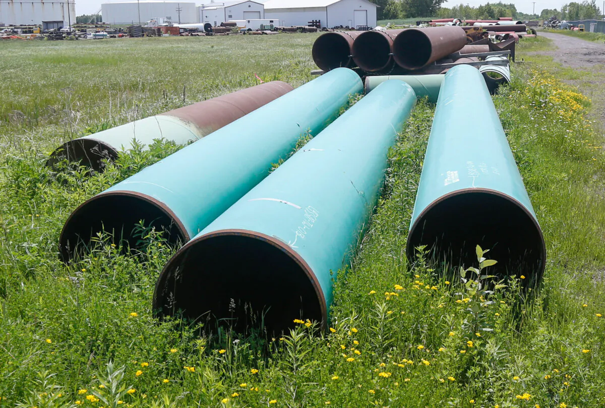 Pipeline used to carry crude oil sits awaiting use at the Superior, Wis., terminal of Enbridge Energy on June 29, 2018. (Jim Mone/AP Photo/File)