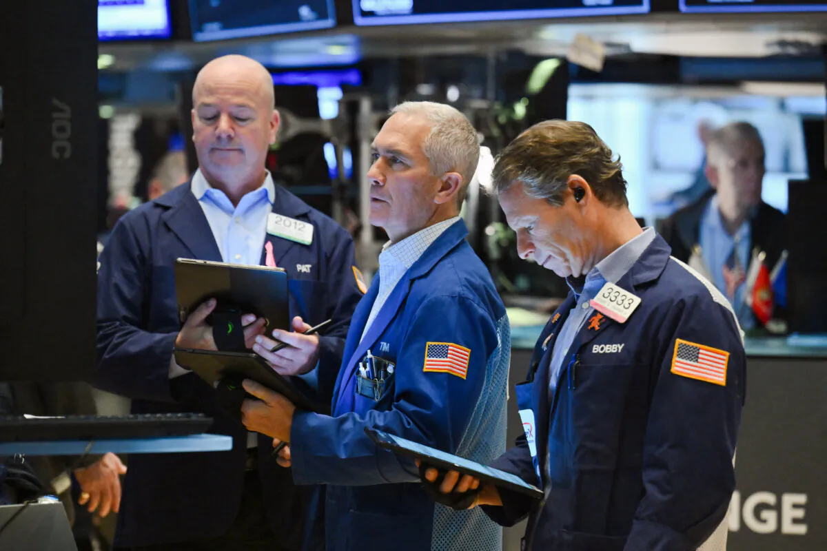 Traders work on the floor of the New York Stock Exchange (NYSE) during morning trading in New York City on Jan. 11, 2024. (Angela Weiss/AFP via Getty Images)