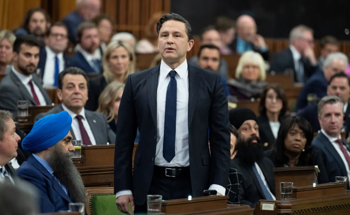 Conservative Leader Pierre Poilievre rises in response to the Speaker asking him to withdraw language
during question period in the House of Commons in Ottawa on April 30, 2024. (The Canadian Press/Adrian Wyld)