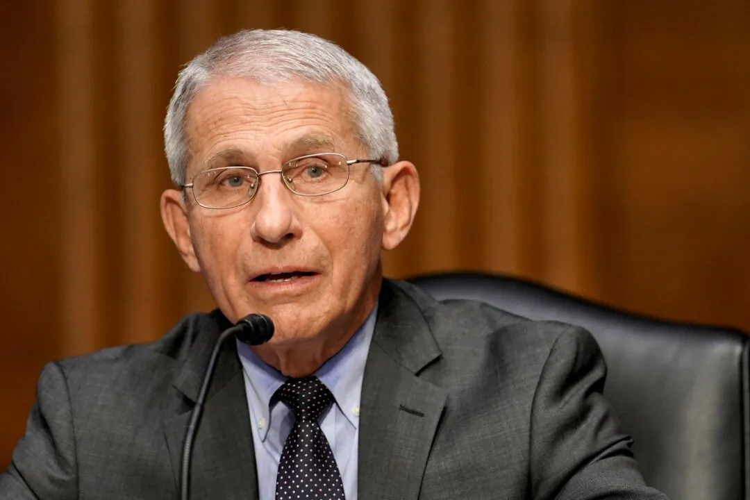 Dr. Anthony Fauci, then-director of the National Institute of Allergy and Infectious Diseases, testifies during a U.S. Senate hearing in Washington, on May 11, 2021. (Greg Nash/Pool/AFP via Getty Images)