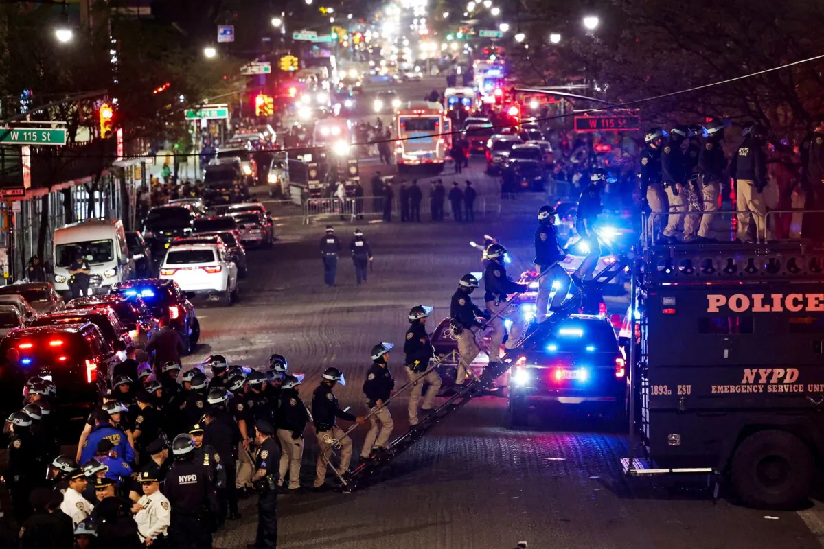 Police use a vehicle called “the bear” to enter Hamilton Hall from a public street, which was occupied by protesters, as other officers enter the campus of Columbia University, during the ongoing conflict between Israel and the Palestinian Islamist group Hamas, in New York on April 30, 2024. (Caitlin Ochs/Reuters)