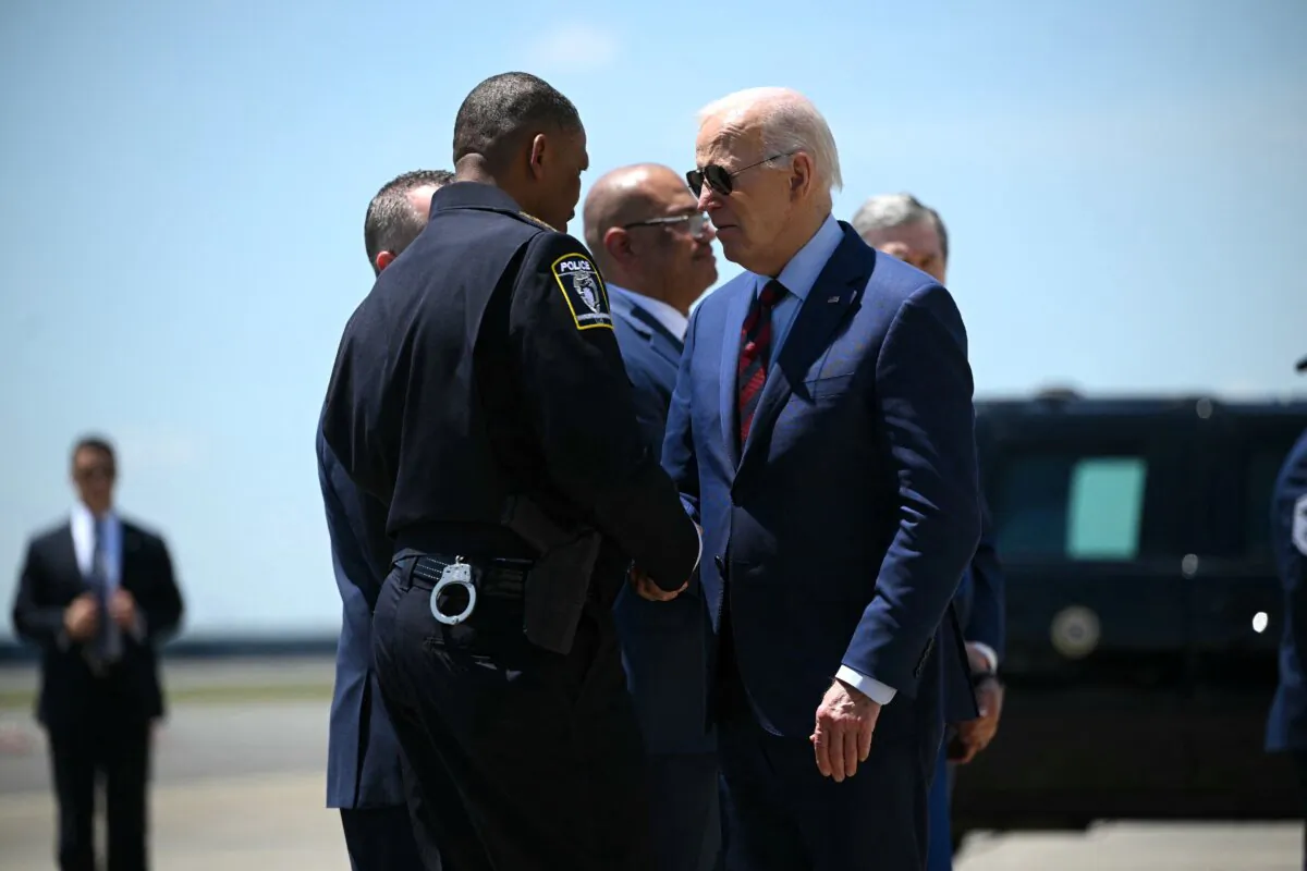 President Joe Biden arrives at Charlotte Douglas International Airport in Charlotte, N.C., on May 2, 2024, to pay respects to law enforcement officers killed and wounded while serving an arrest warrant. (Mandel Ngan/AFP via Getty Images)