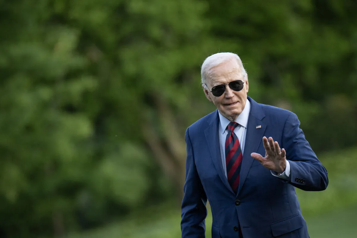 U.S. President Joe Biden waves as he walks to the White House residence after exiting Marine One on the South Lawn of the White House in Washington on May 2, 2024. (Drew Angerer/AFP)