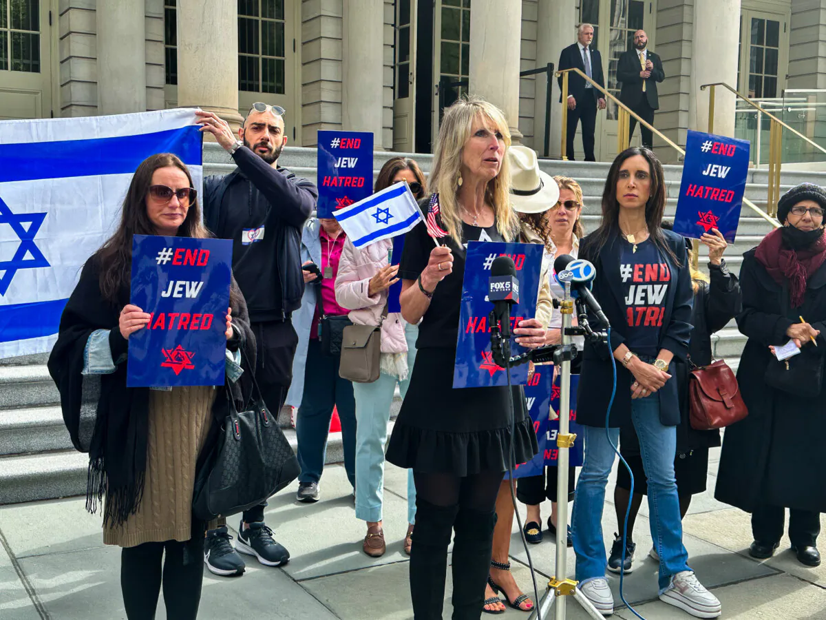 Hillary Barr speaks at a press conference on the steps of City Hall in New York on May 1, 2024. (Juliette Fairley/The Epoch Times)