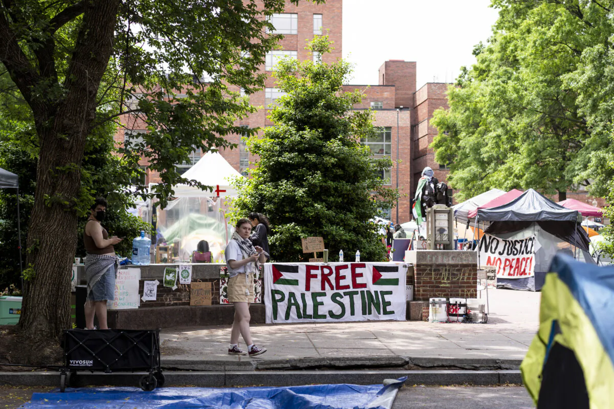 Students protesting at George Washington University in Washington on May 3, 2024. (Madalina Vasiliu/The Epoch Times)