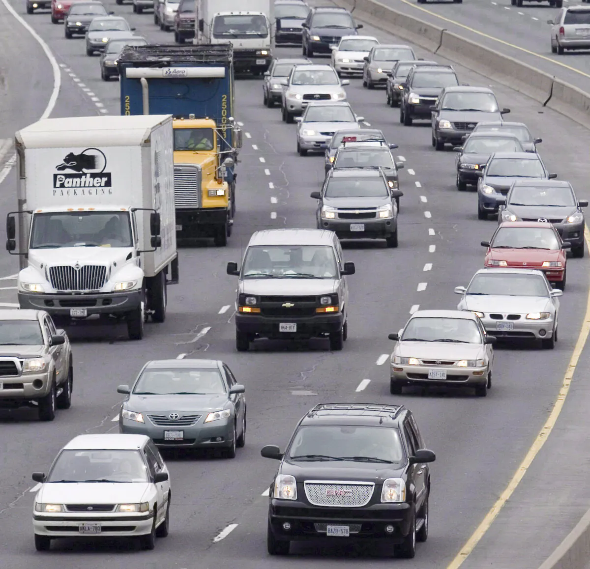 Traffic moves slowly along a congested highway in Toronto in a file photo. (The Canadian Press/Lars Hagberg)