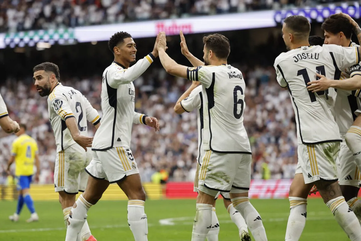 Real Madrid's English midfielder (5) Jude Bellingham celebrates scoring his team's second goal during the Spanish league football match between Real Madrid CF and Cadiz CF at the Santiago Bernabeu stadium in Madrid on May 4, 2024. (Oscar Del Pozo/AFP)