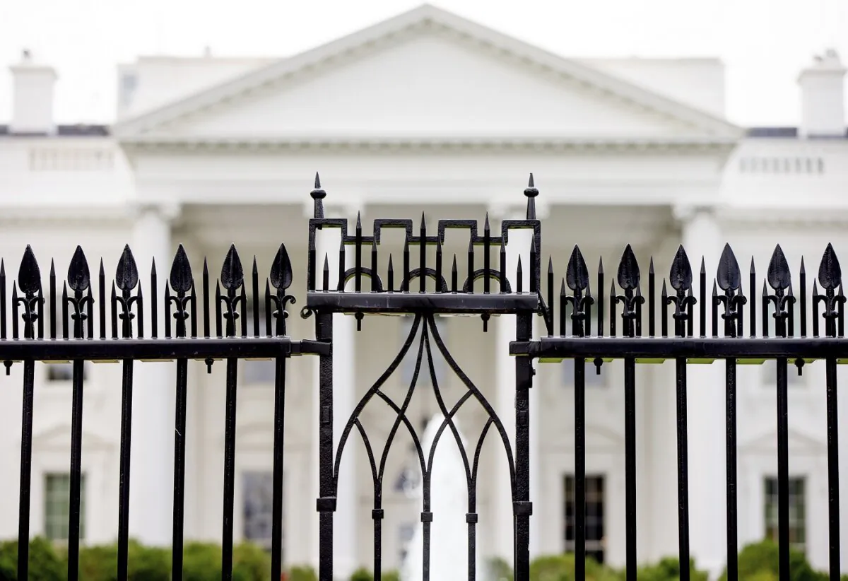 The White House is visible through the fence at the North Lawn, on June 16, 2016. (Andrew Harnik/AP Photo)