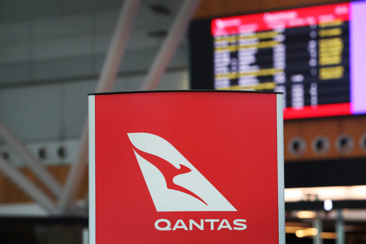 Signage is seen on display at the Qantas domestic terminal at Sydney Airport in Sydney, Australia, on Aug. 25, 2022. (Lisa Maree Williams/Getty Images)