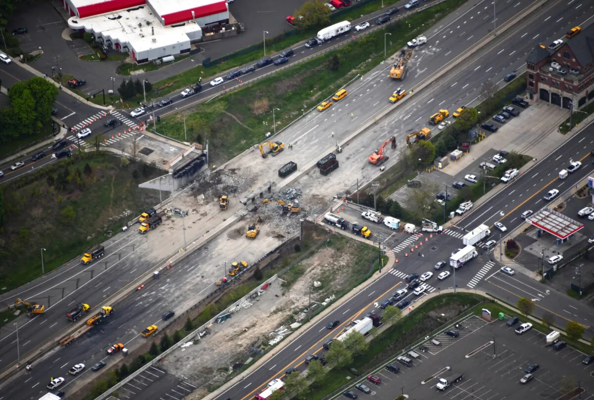 This aerial view looking south shows demolition crews working to finish removing the Fairfield Avenue bridge over Interstate 95 in Norwalk, Conn., on Saturday, May 4, 2024 (Kevin Coughlin / All Island Aerial via AP)