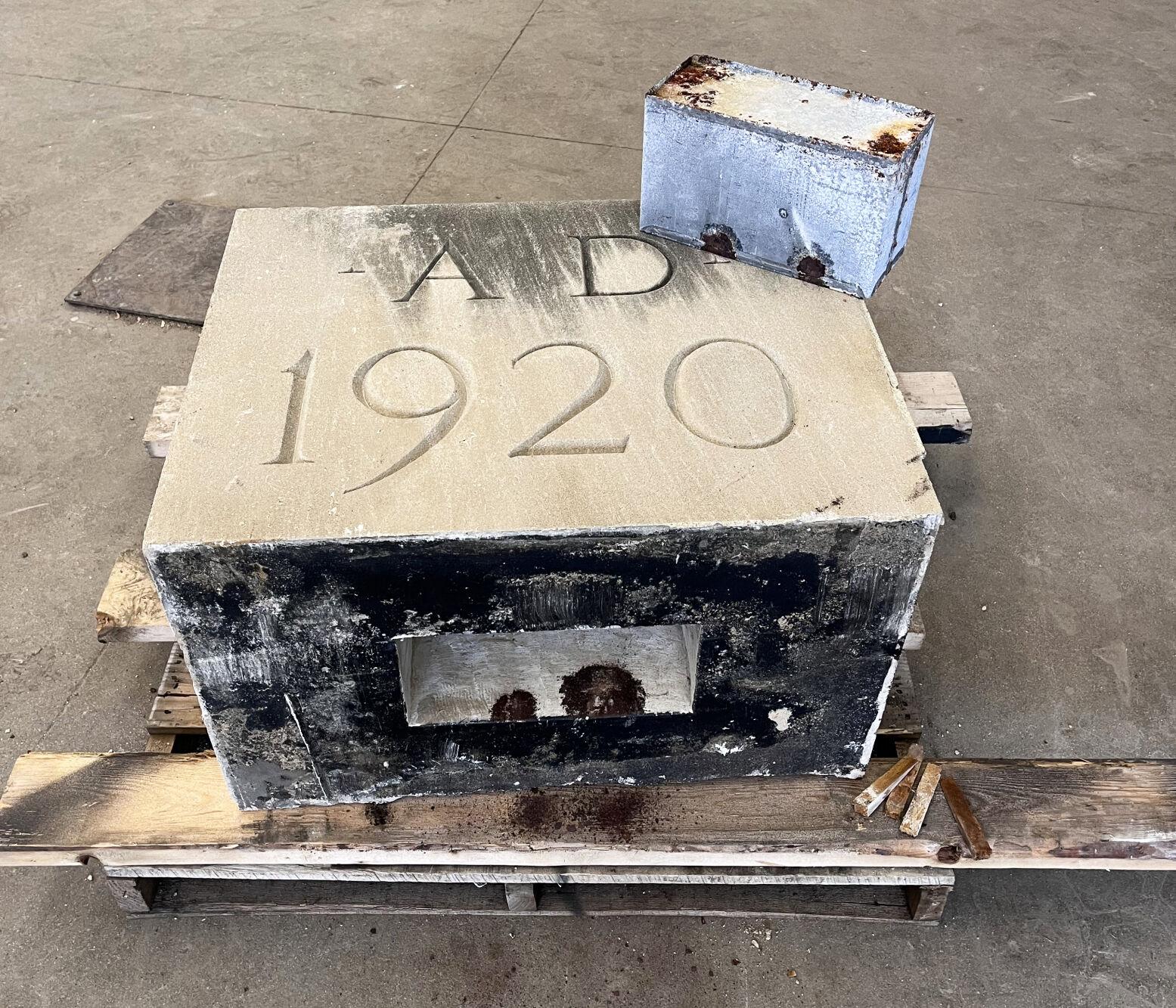 The cornerstone in the high school building with AD 1920 inscribed on it.